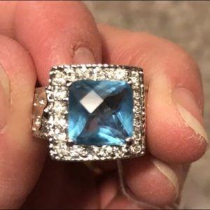 Blue topaz gold and silver ring